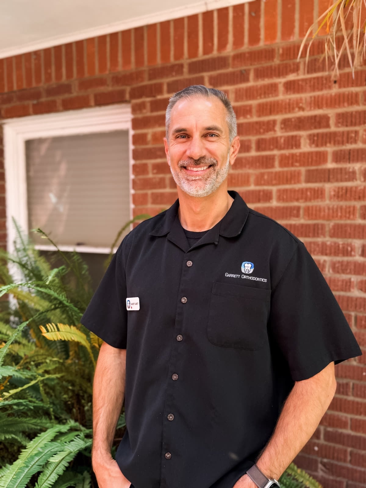 Dr. Brett Garrett outside the San Luis Obispo office.