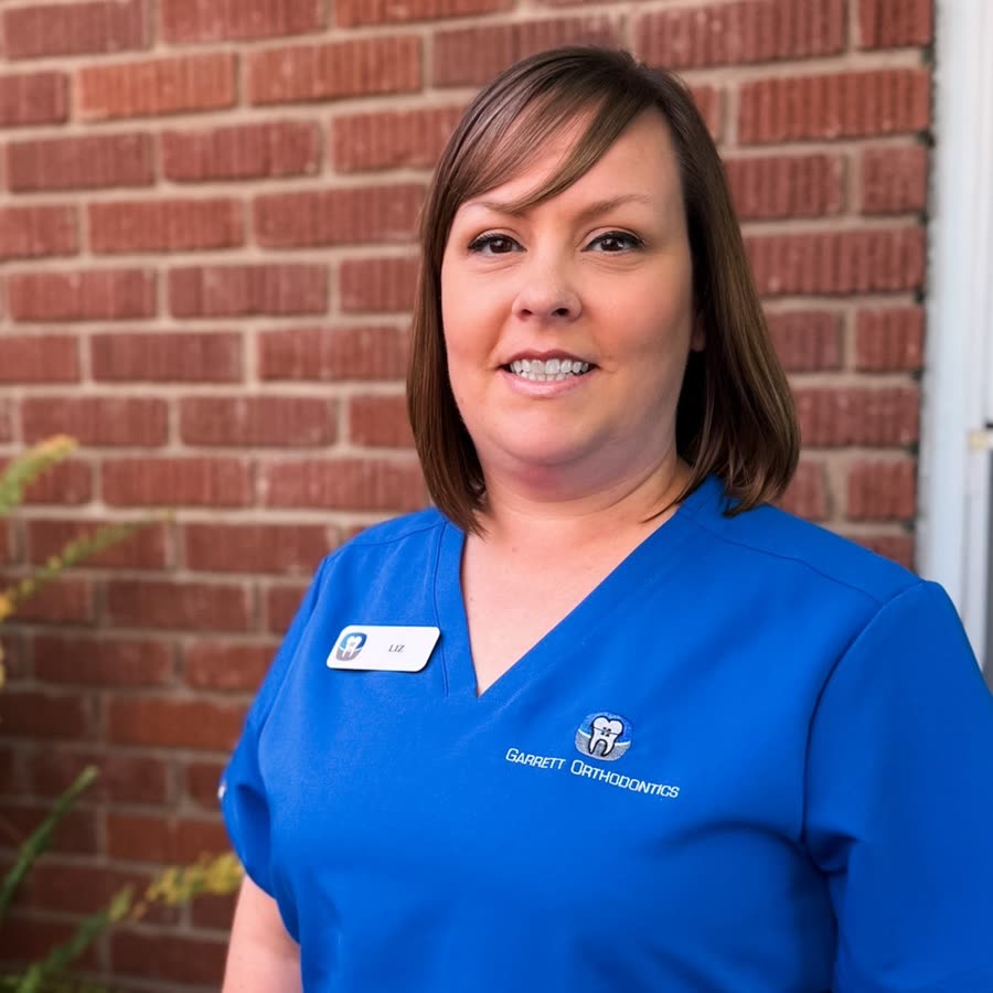 Liz, Front Office Scheduler.